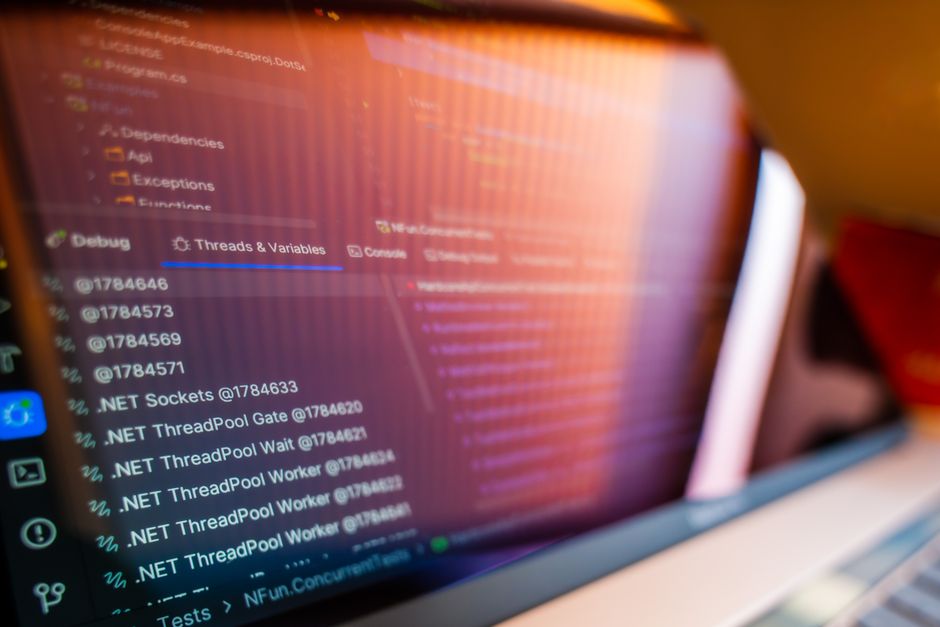 Computer screen showing code and debug information while fixing a Make.com bundle validation error